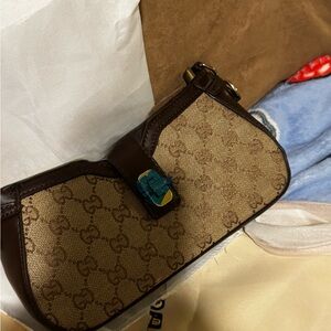 Brown Monogram Shoulder Bag with Blue Accent